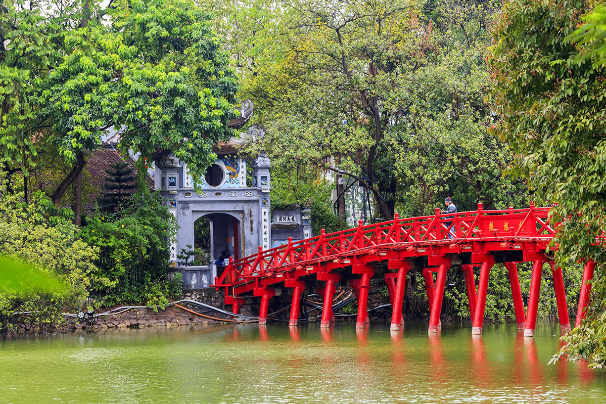 Scenic view of Hoan Kiem Lake and The Huc Bridge under blue skies in March